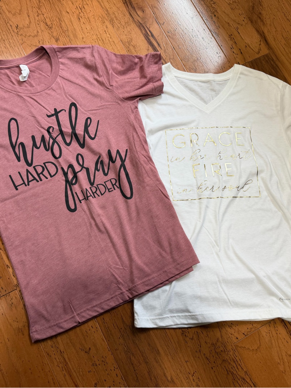 2 women’s graphic T’s Mauve Pink and white